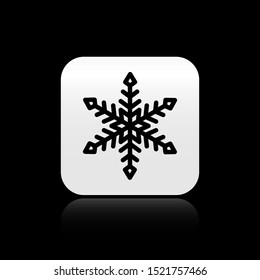Black Snowflake icon isolated on black background. Silver square button. Vector Illustration
