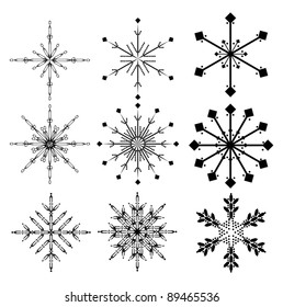colección negra de copos de nieve sobre fondo blanco