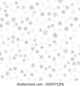 Black snowflakes seamless pattern on white Christmas background.