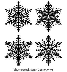 Black Snowflakes - Set of 4 beautiful black snowflakes isolated on white background