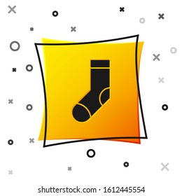Black Socks icon isolated on white background. Yellow square button. Vector Illustration