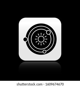 Black Solar system icon isolated on black background. The planets revolve around the star. Silver square button. Vector Illustration