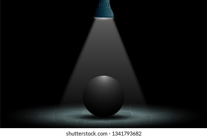 black sphere on the marble floor with spotlight in the dark room