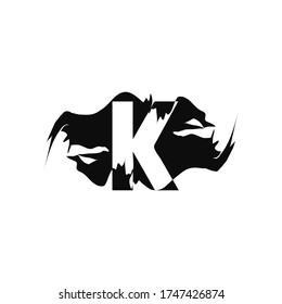 Black Splash K Negative Space Letter logo Icon. Abstract design concept art mountain splash with hidden letter vector design.