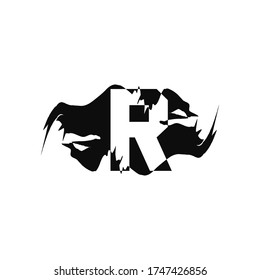 Icono de la letra negra de la espoleta R del espacio negativo. Diseño abstracto concepto arte salpicadura de montaña con diseño vectorial de letras ocultas.
