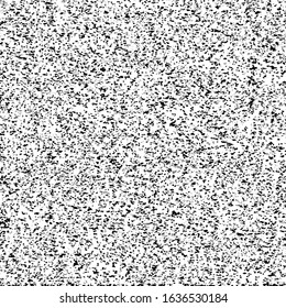 Black splashes scattered on white surface. Flecked background.