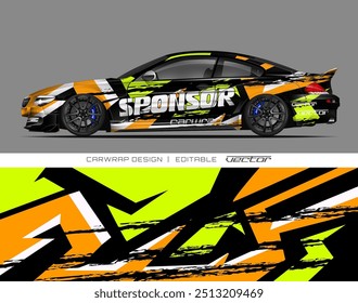 Black sports car featuring an eyecatching orange, green, and white wrap design. Ideal for automotive marketing materials and sports car enthusiasts.