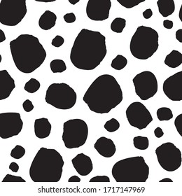 Black spots on white background seamless vector pattern. Abstract background with round brush strokes. Monochrome hand drawn texture for fabric, wallpaper, cards, fashion or backgrounds.