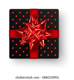 Schwarz quadratische Geschenkbox mit großem glänzendem rotem Bugband und glänzendem Polka-Dot-Design, Draufsicht einzeln auf weißem Hintergrund. Realistische Vektorgrafik von Valentinstag-, Weihnachts- oder Geburtstagsgeschenk