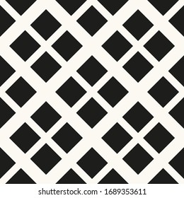Black squares on white background. Seamless textile.
