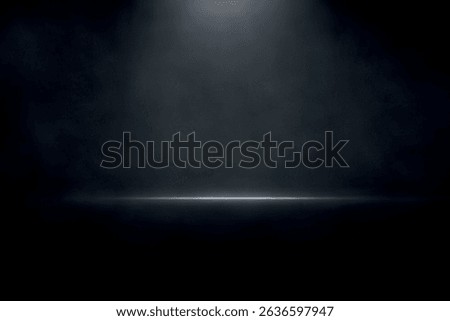 Black stage illuminated by single spotlight with smoky texture and reflective floor