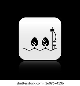 Black Standalone sensor and plant icon isolated on black background. Silver square button. Vector Illustration