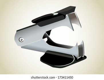 black staple remover against