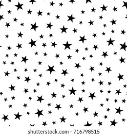 Black stars seamless pattern on white cool background.