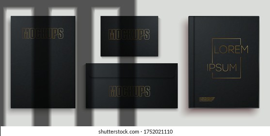 Black stationery business branding mock up template, on gray background to place your design. Blank book, envelope, business card, A4 sheet paper, cover layout design with shadows for branding. Vector