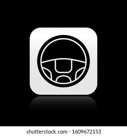 Black Steering wheel icon isolated on black background. Car wheel icon. Silver square button. Vector Illustration