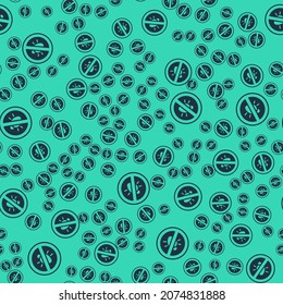 Black Stop colorado beetle icon isolated seamless pattern on green background.  Vector