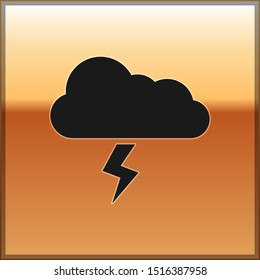 Black Storm icon isolated on gold background. Cloud and lightning sign. Weather icon of storm.  Vector Illustration