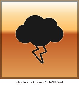 Black Storm icon isolated on gold background. Cloud and lightning sign. Weather icon of storm.  Vector Illustration