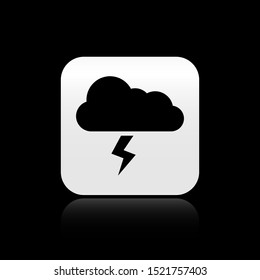 Black Storm icon isolated on black background. Cloud and lightning sign. Weather icon of storm. Silver square button. Vector Illustration