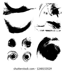Black straight and round abstract textured paint strokes isolated on white background