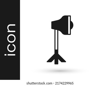 Schwarze Studio-Glühbirne in der Softbox-Symbol einzeln auf weißem Hintergrund. Schattenreflexdesign.  Vektorgrafik