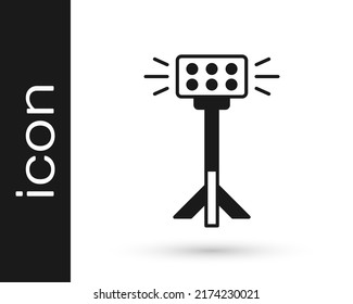 Black Studio light bulb in softbox icon isolated on white background. Shadow reflection design.  Vector