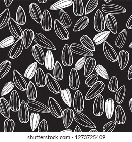 Black sunflower seeds. Vector seamless pattern