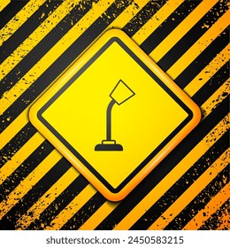 Black Table lamp icon isolated on yellow background. Warning sign. Vector