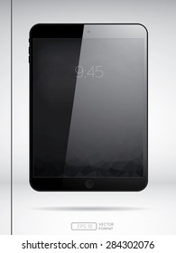 Black tablet with black low poly art background