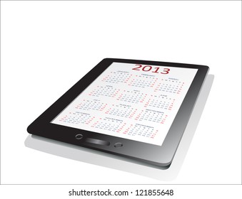 Black tablet pc on white background WIth calendar 2013.