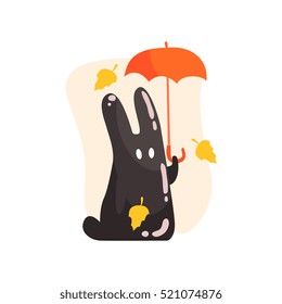 Black Tar Jelly Rabbit Shape Monster Holding Orange Umbrella Under Falling Yellow Leaves Outdoors In Autumn Season