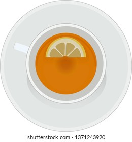 black tea with lemon on a white saucer and in a white Cup
