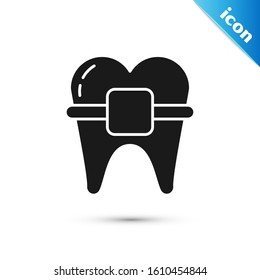 Black Teeth with braces icon isolated on white background. Alignment of bite of teeth, dental row with with braces. Dental concept.  Vector Illustration