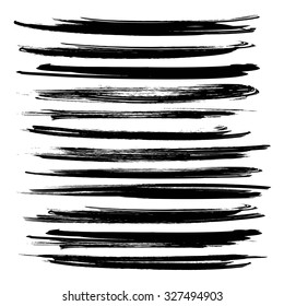 Black textured long dry paint strokes set isolated on white background 1