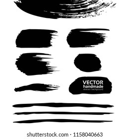 Black textured smears of different forms isolated on a white background