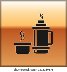 Black Thermos container icon isolated on gold background. Thermo flask icon. Camping and hiking equipment.  Vector Illustration