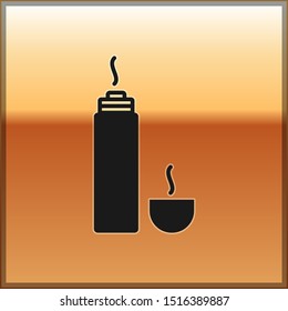Black Thermos container icon isolated on gold background. Thermo flask icon. Camping and hiking equipment.  Vector Illustration