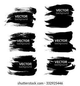 Black thick textured brush strokes isolated on white background