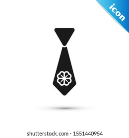 Black Tie with four leaf clover icon isolated on white background. Necktie and neckcloth symbol. Happy Saint Patricks day.  Vector Illustration