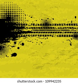 Black tire track banner on yellow background