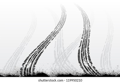 Black tire tracks with ink blots