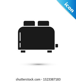 Black Toaster with toasts icon isolated on white background.  Vector Illustration
