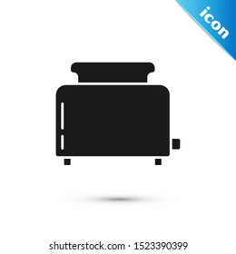 Black Toaster with toasts icon isolated on white background.  Vector Illustration