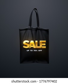 Black tote bag with golden SALE sign. Vector 3d illustration. Reusable textile handbag mockup design. Realistic canvas shopping bag. Design element for sale or discount banners, posters, cards
