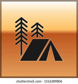 Black Tourist tent icon isolated on gold background. Camping symbol.  Vector Illustration