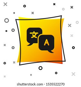 Black Translator icon isolated on white background. Foreign language conversation icons in chat speech bubble. Translating concept. Yellow square button. Vector Illustration