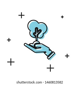 Black Tree in hand of environmental protection icon isolated on white background. Seed and seedling. Planting sapling. Ecology concept.  Vector Illustration