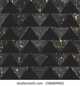 Black triangle pattern with grunge spectrum spots.