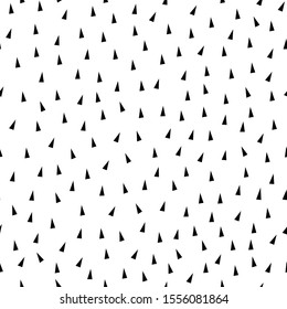 Black triangles on a white background. Seamless pattern. Can be used for fabrics.